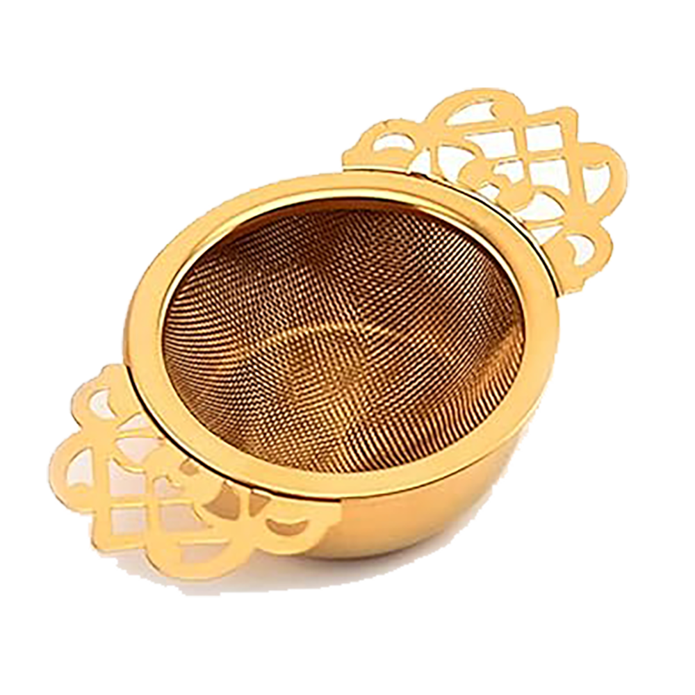 A gold gilded tea strainer with bowl